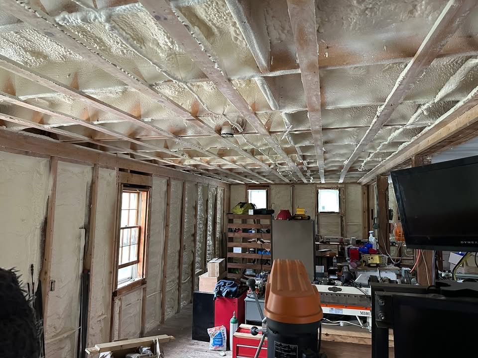 Closed cell spray foam insulation applied to a ceiling